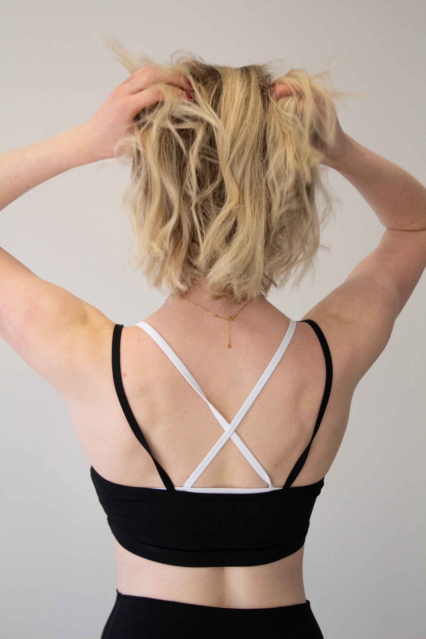 MAREN DOUBLE LAYER SPORTS BRA - JET BLACK + BRIGHT WHITE