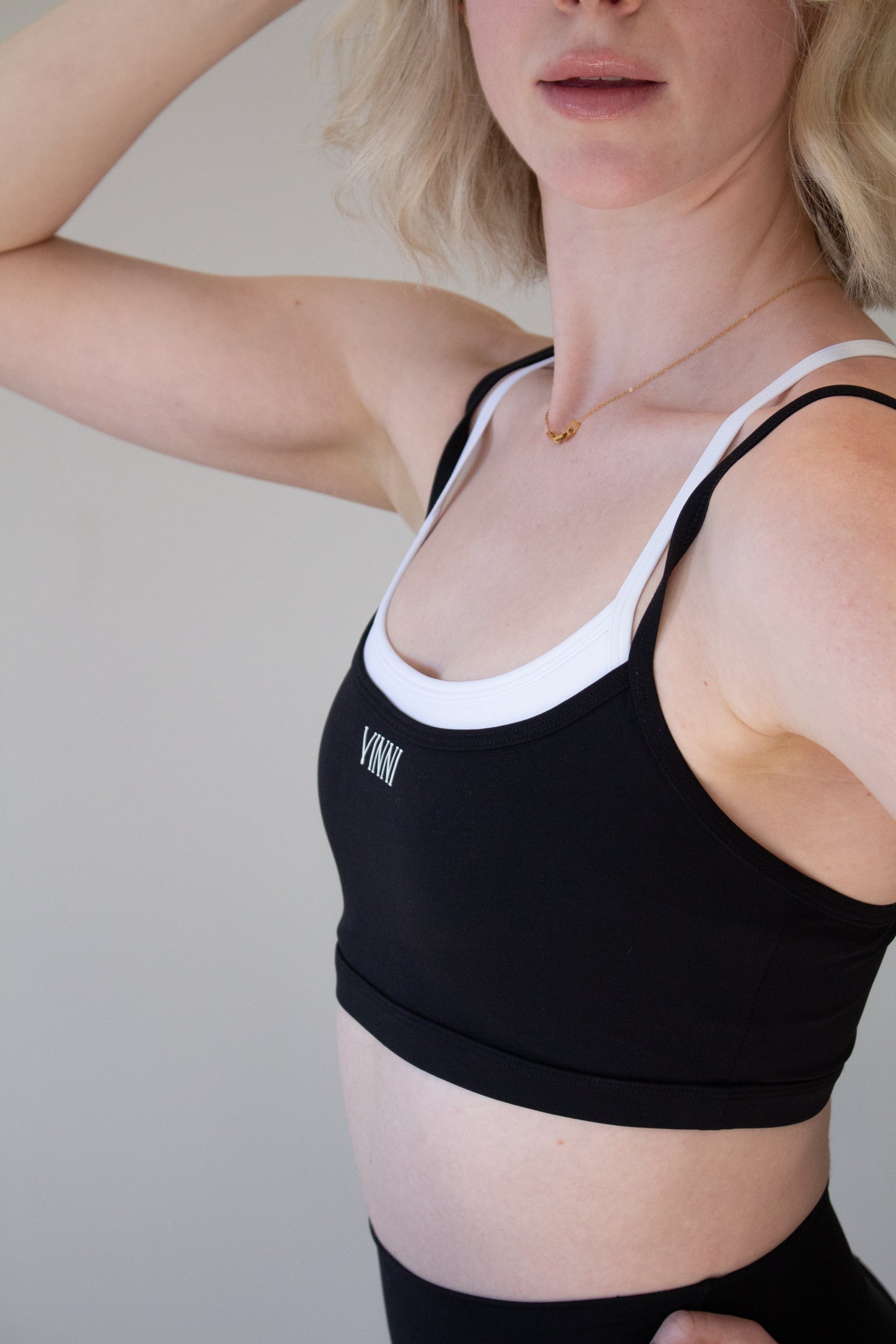 MAREN DOUBLE LAYER SPORTS BRA - JET BLACK + BRIGHT WHITE
