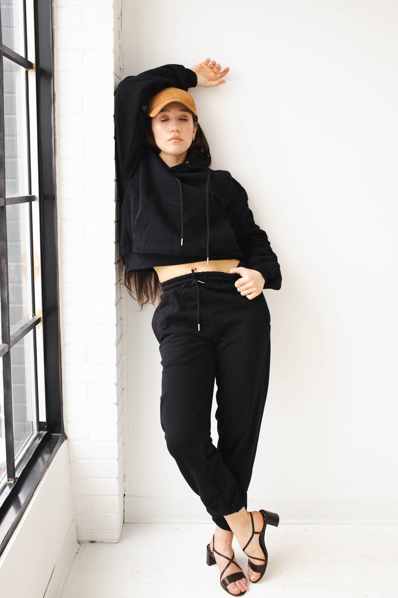 Black sweatsuit with drawstrings